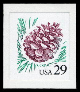 Stamp with etching of a pinecone surrounded by pine needles on a white background